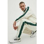 Pamučni donji dio trenirke New Balance boja: bež, s uzorkom, MP41504LIN